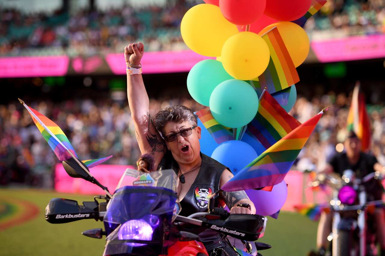 Participants take part in the 43rd annual Gay and Lesbian Mardi Gras parade at the SCG in Sydney, Saturday, March 6, 2021. (AAP Image/Dan Himbrechts) NO ARCHIVING