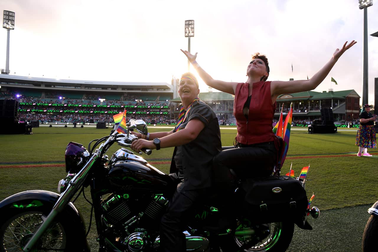 Participants take part in the 43rd annual Gay and Lesbian Mardi Gras parade at the SCG in Sydney, Saturday, March 6, 2021. (AAP Image/Dan Himbrechts) NO ARCHIVING