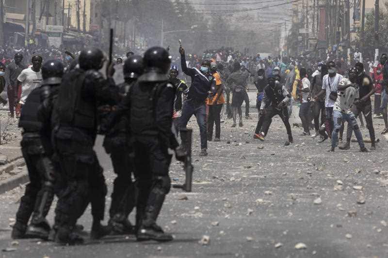 Demonstrators protest against the arrest of opposition leader and former presidential candidate Ousmane Sonko in Dakar, Senegal, Friday, March 5, 2021.