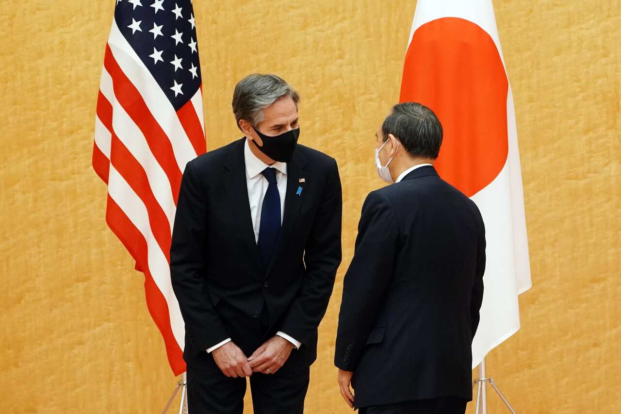 Japanese Prime Minister Yoshihide Suga talks with US Secretary of State Antony Blinken in Tokyo, Japan, 16 March 2021. 