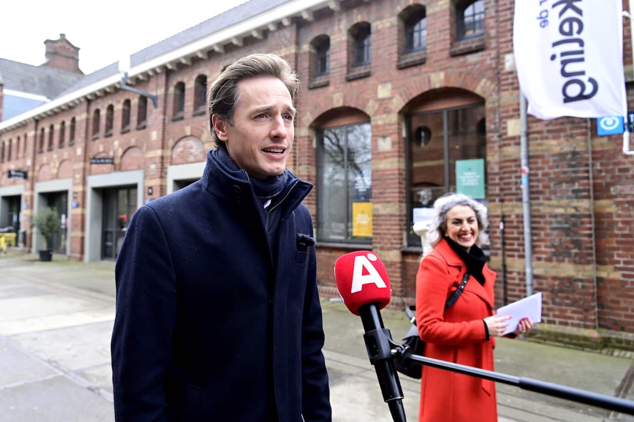 Volt Party leader Laurens Dassen and Nilufer Gundogan arrive at Theater de Krakeling to vote for the parliamentary elections in Amsterdam.