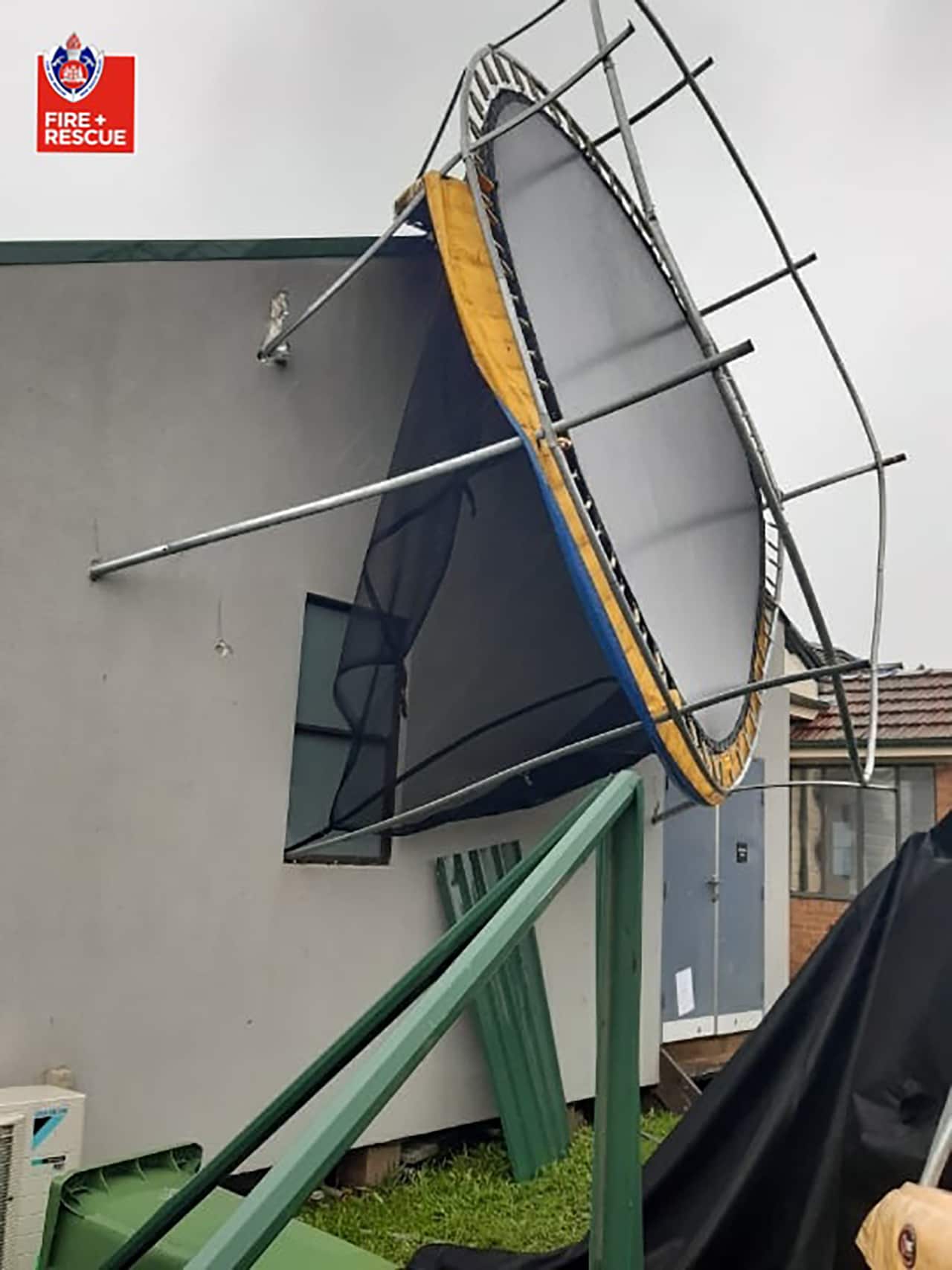 A supplied image of a trampoline stuck against the side of a house in Chester Hill, Sydney. 