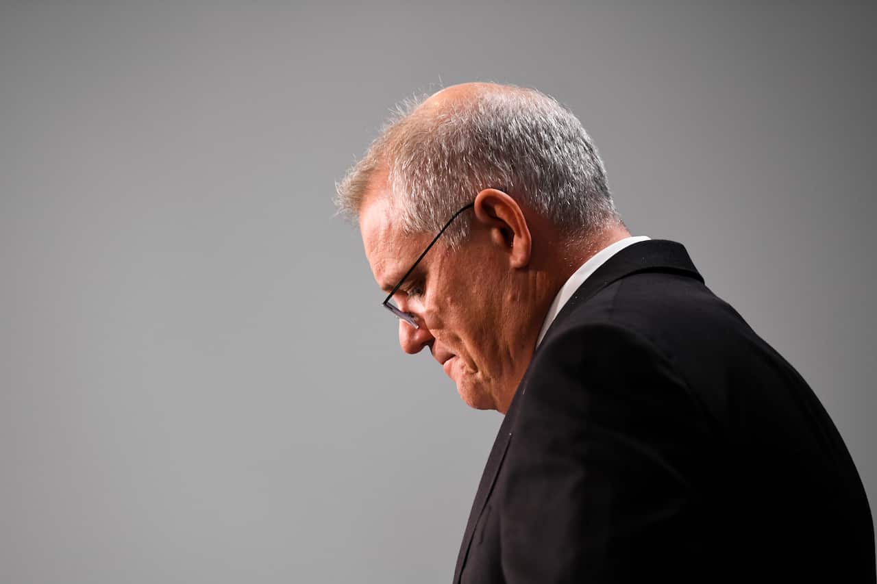 Prime Minister Scott Morrison reacts during a press conference at Parliament House.