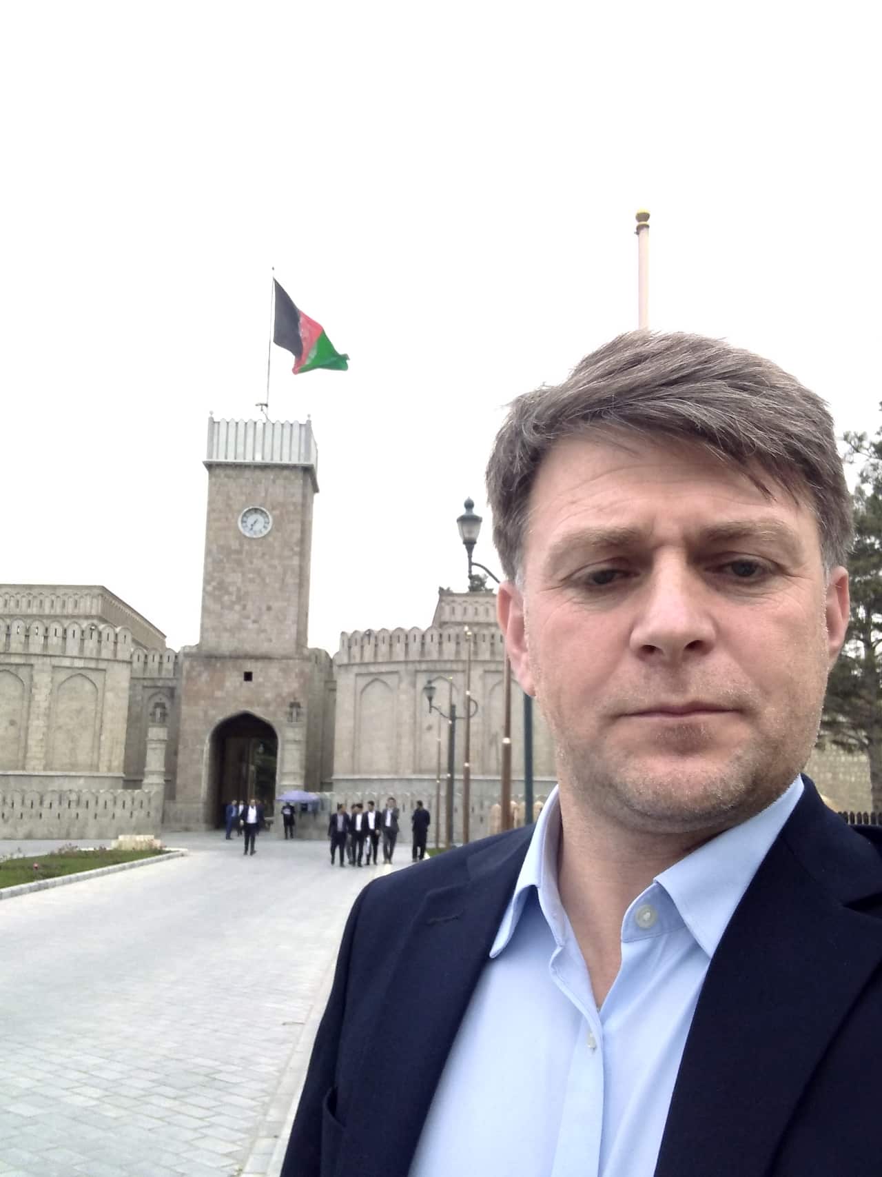 Mohib Iqbal outside the Afghan presidential palace before it fell to the Taliban.