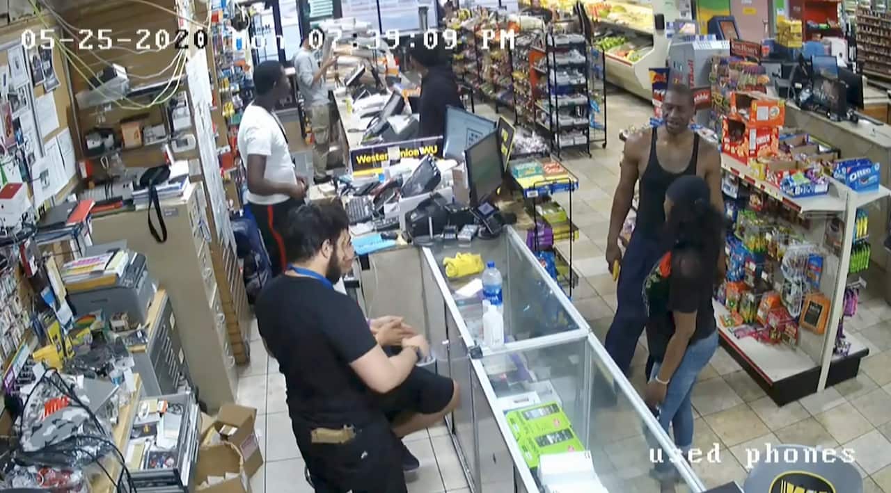 CCTV footage of George Floyd, right, inside Cup Foods on May 25, 2020, in Minneapolis.