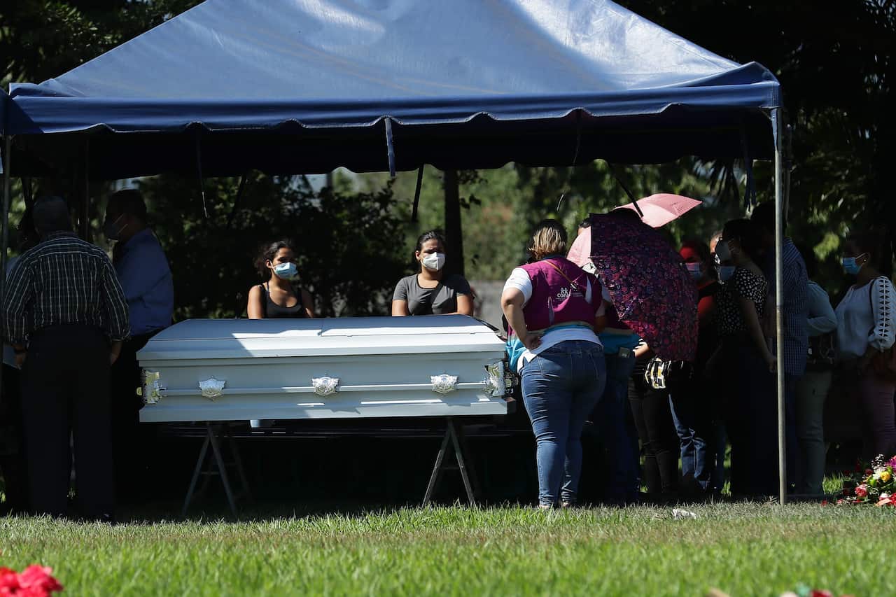 Relatives and friends attend the funeral of Victoria Salazar in Sonsonate, El Salvador
