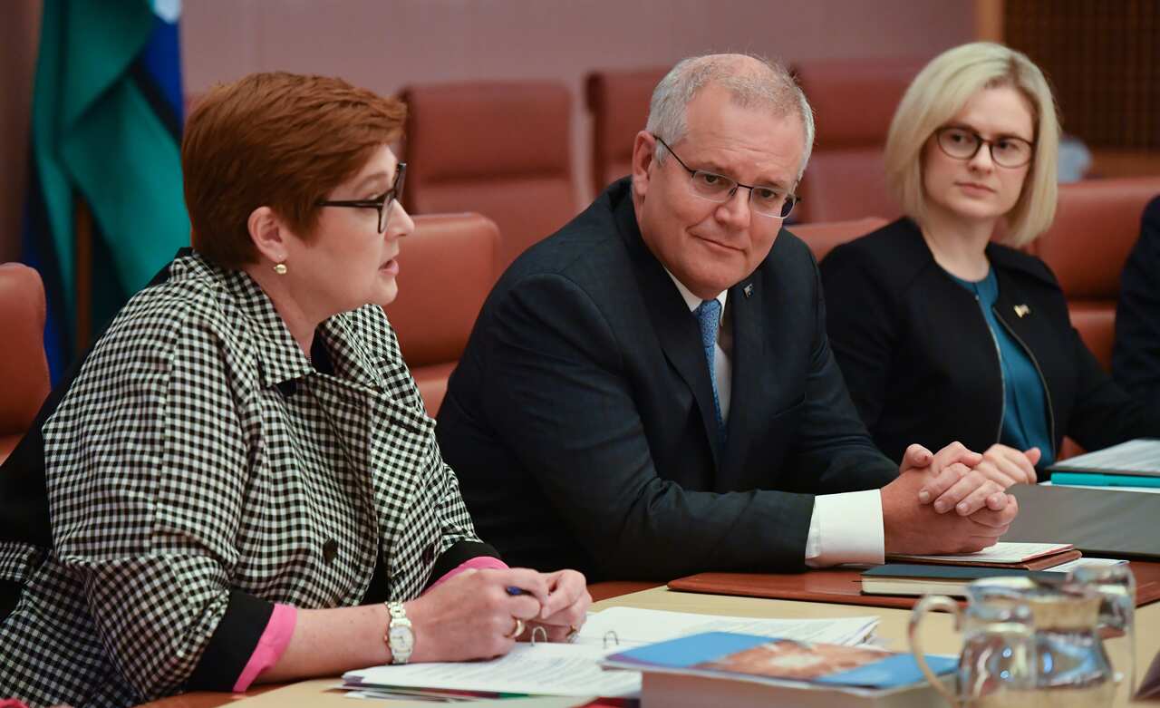Marise Payne, Scott Morrison and Amanda Stoker at the Cabinet Women's Task Force Meeting at Parliament House in Canberra. Tuesday, April 6, 2021.