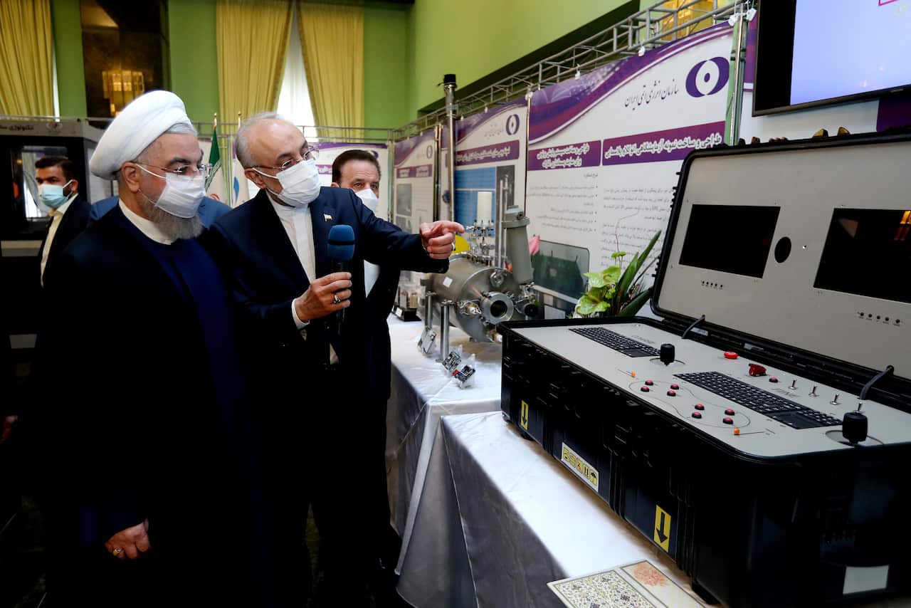 Iranian President Hassan Rouhani and Head of the Atomic Energy Organisation of Iran Ali Akbar Salehi.