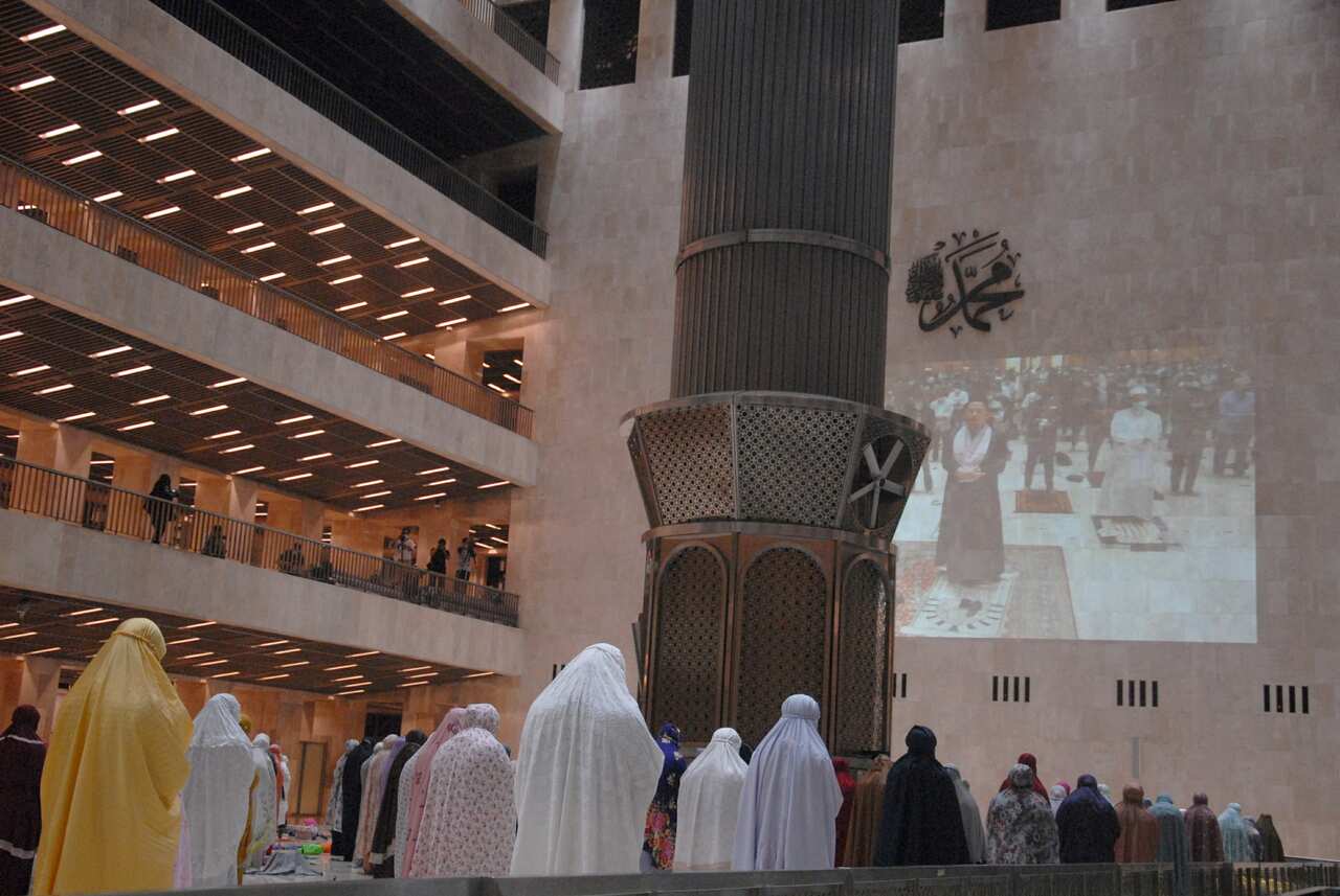 Muslims gather for the first tarawih prayer during the start of the holy month of Ramadan at Istiqlal Mosque in Jakarta, Indonesia on 12 April, 2021. 