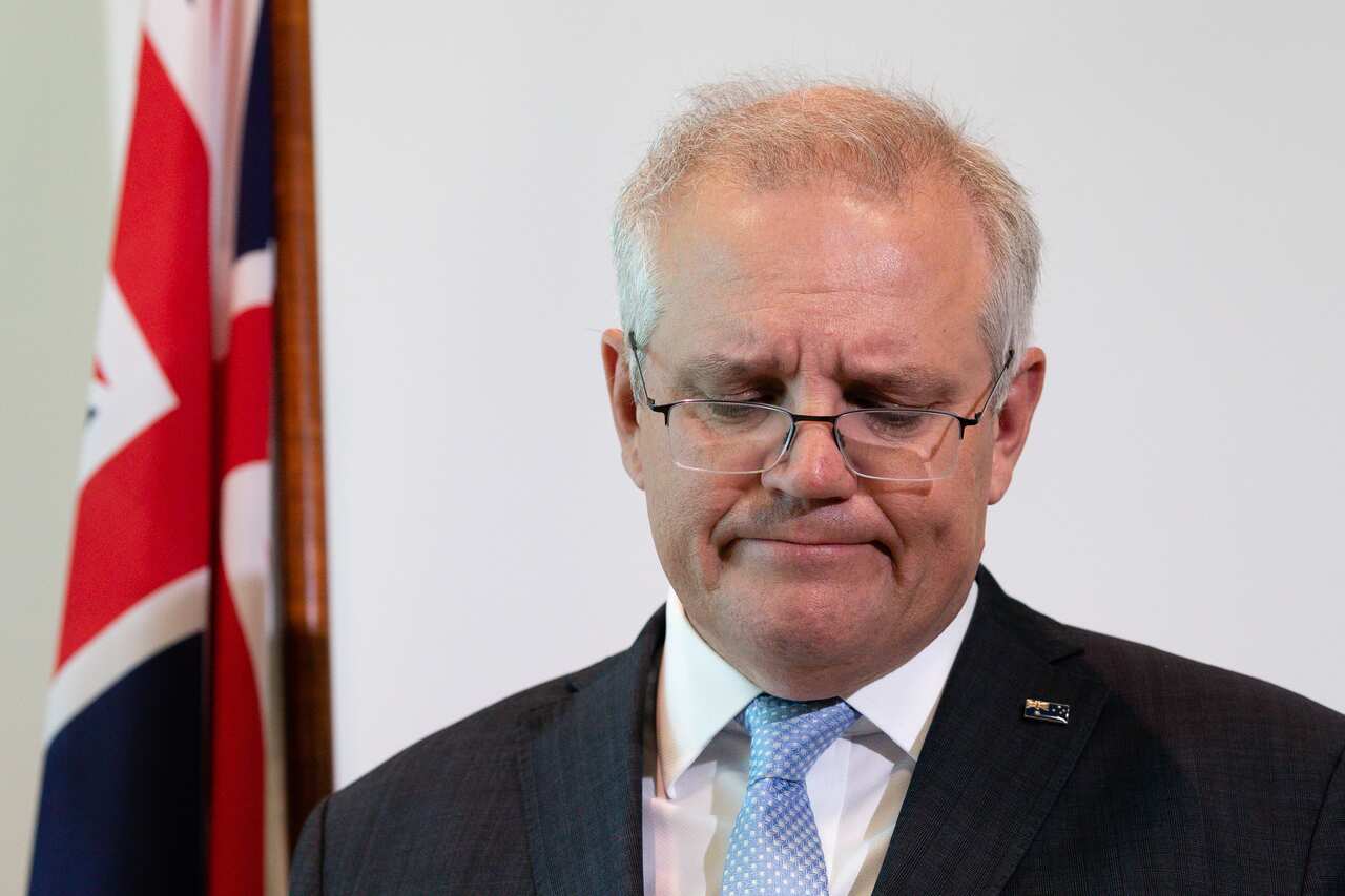 Prime Minister Scott Morrison reacts after reading out the names of 41 ADF personnel who have died in Afghanistan since 2001 during a press conference in Perth, Thursday, April 15, 2021. (AAP Image/Richard Wainwright) NO ARCHIVING