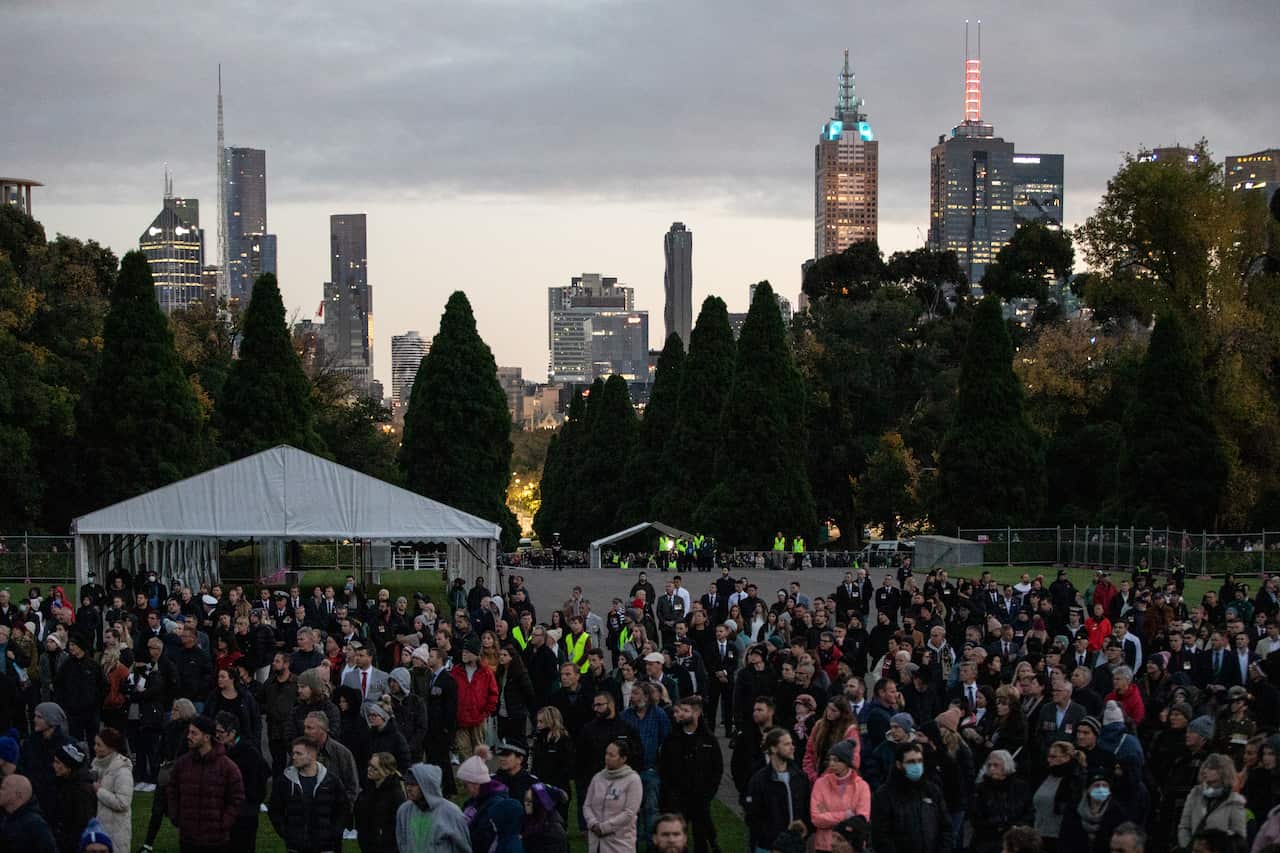 People gather for the Anzac Day Dawn Service at the Shrine of Remembrance in Melbourne.