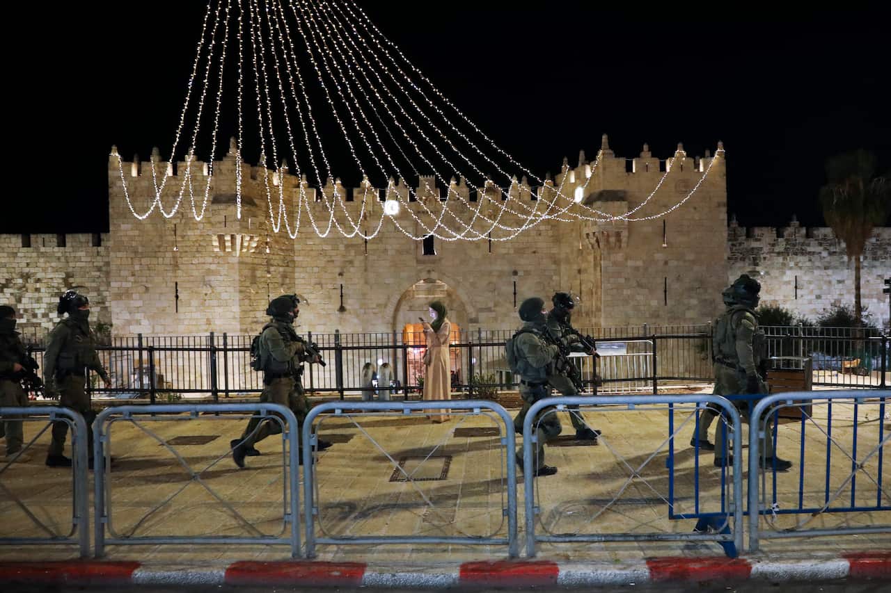 Israeli border police officers deploy during clashes with Palestinian protesters next to Damascus Gate in Jerusalem's old city, Friday, May 7. 2021. 