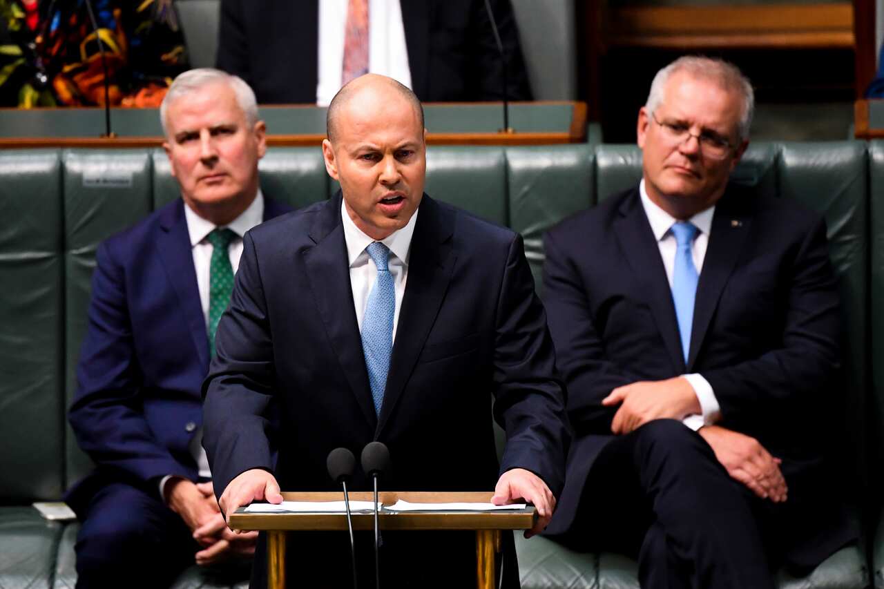 Australian Treasurer Josh Frydenberg hands down his third Federal Budget in the House of Representatives at Parliament House in Canberra, 11 May, 2021.