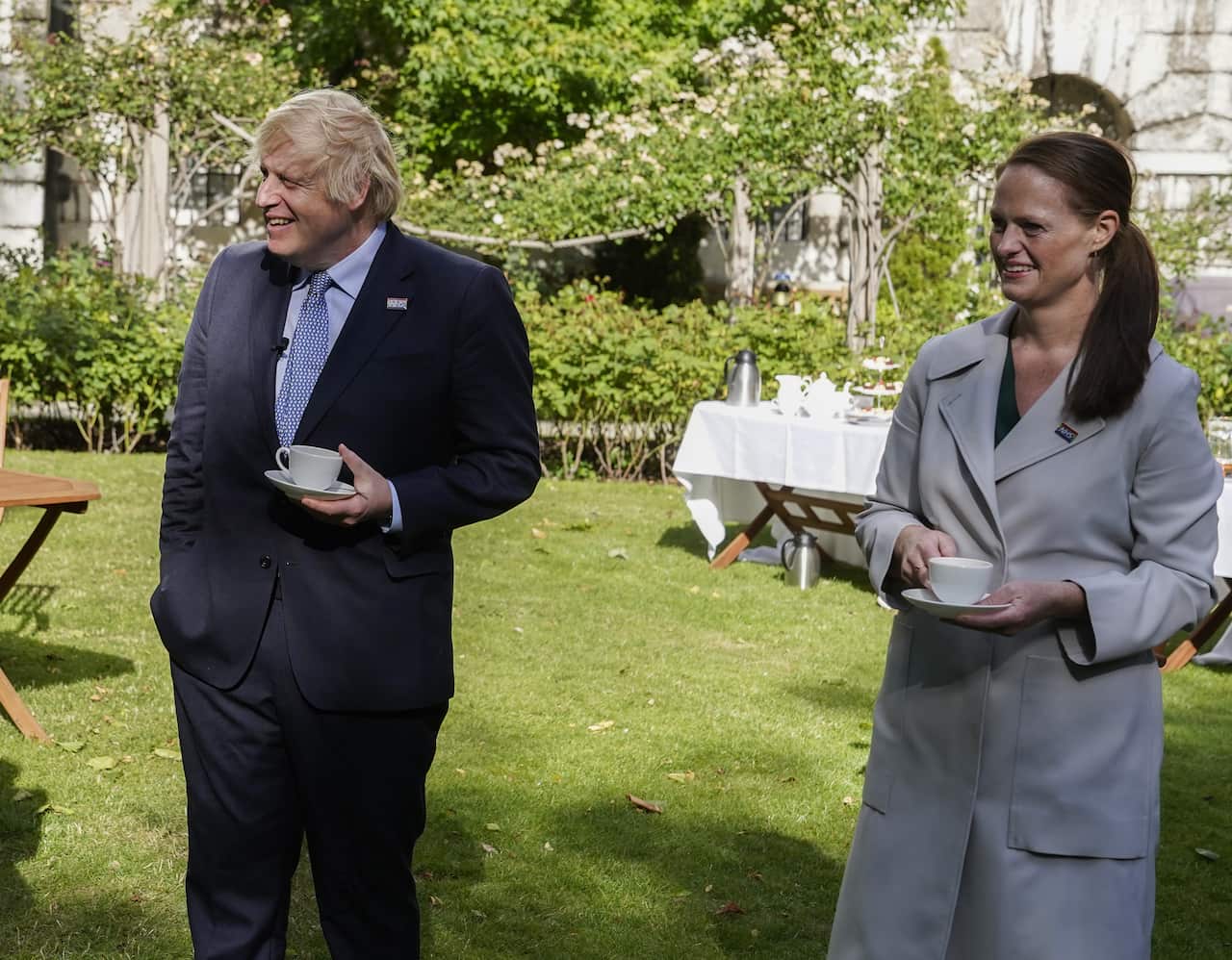 NHS nurse Jenny McGee at a Downing Street garden party with Prime Minister Boris Johnson, 7 May, 2020.