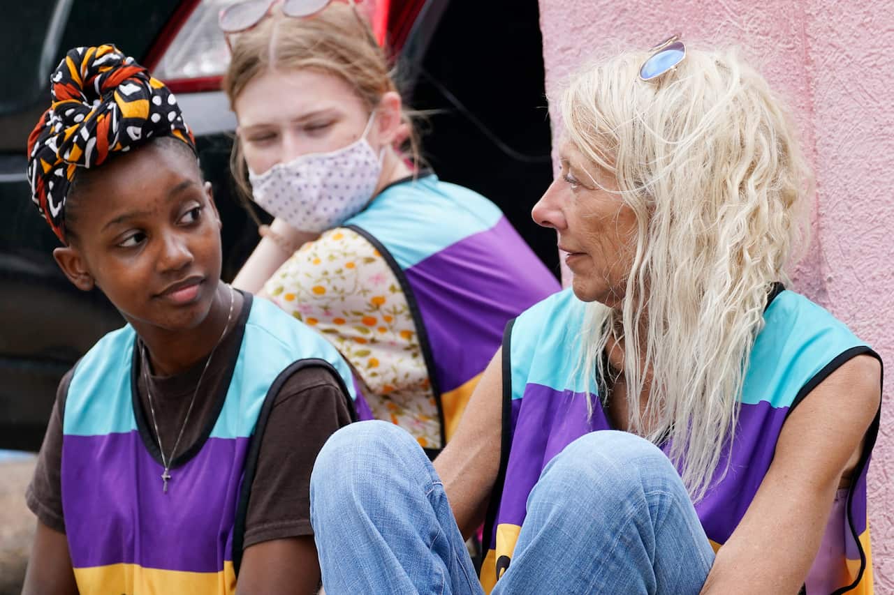 Veteran clinic escorts Derenda Hancock, Asia Brown and Ellie Rome waiting outside the Jackson Women’s Health Organization clinic for patients on 20 May 2021.