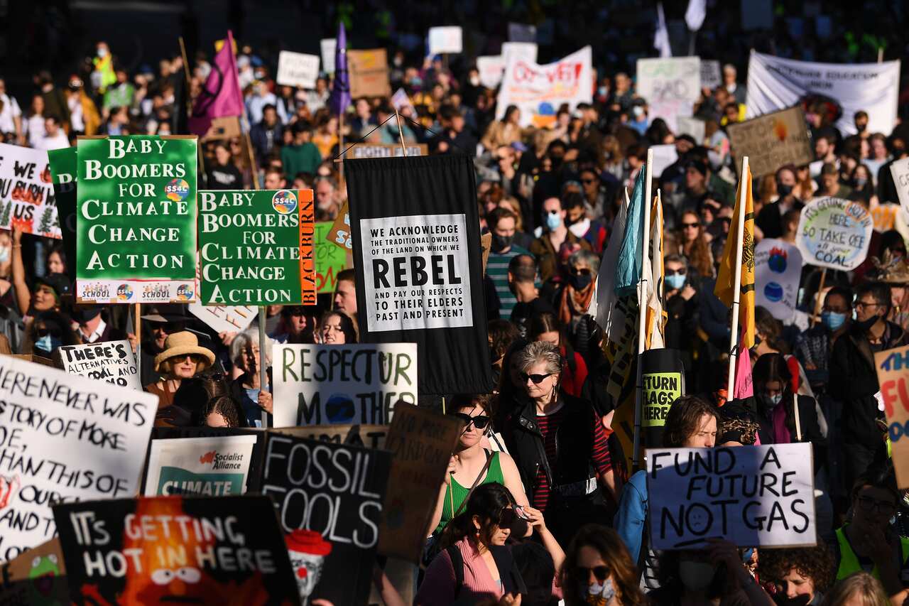 Protesters are seen during School Strike 4 Life protest, in Melbourne, Friday, May 21, 2021.