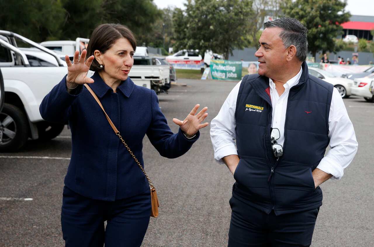 NSW Premier Gladys Berejiklian speaks with NSW Nationals Leader and Deputy Premier John Barilaro on polling day in Muswellbrook, Saturday, 22 May, 2021. 