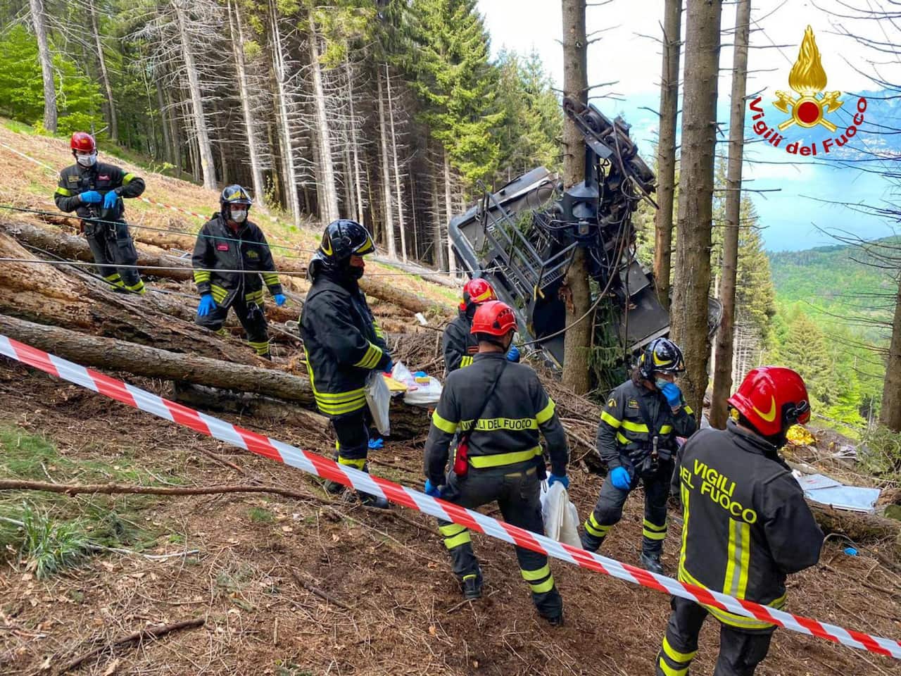 Italian Fire and Rescue Service shows Rescuers at work at the area of the cable car accident, near Lake Maggiore, northern Italy on 23 May 2021. 