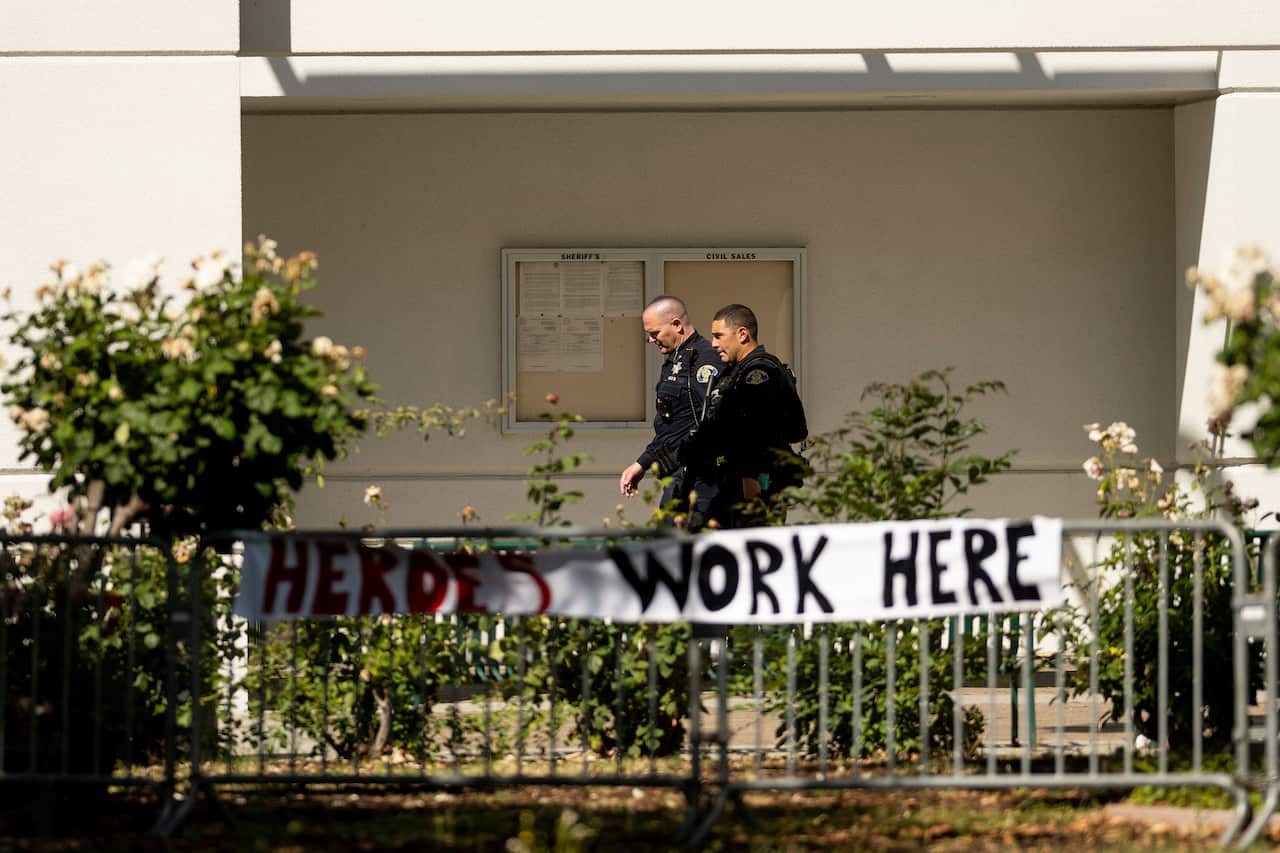 Law enforcement officers respond to the scene of a shooting at a Santa Clara Valley Transportation Authority (VTA) facility on 26 May 2021 in San Jose.