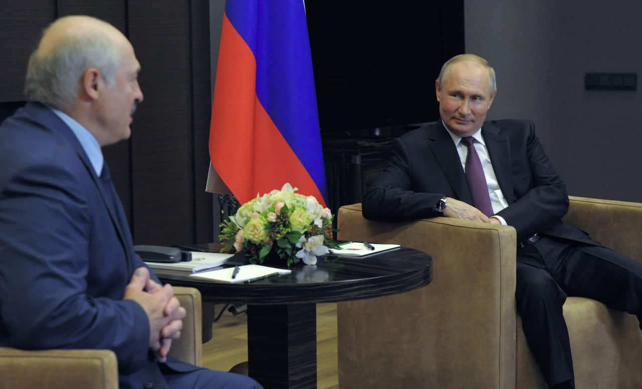 Russian President Vladimir Putin (R) speaks with Belarusian President Alexander Lukashenko (L) during their meeting in Sochi, Russia, 28 May, 2021