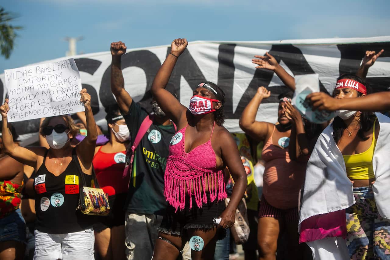 Demonstrators shouts slogans at the protest in Rio de Janeiro