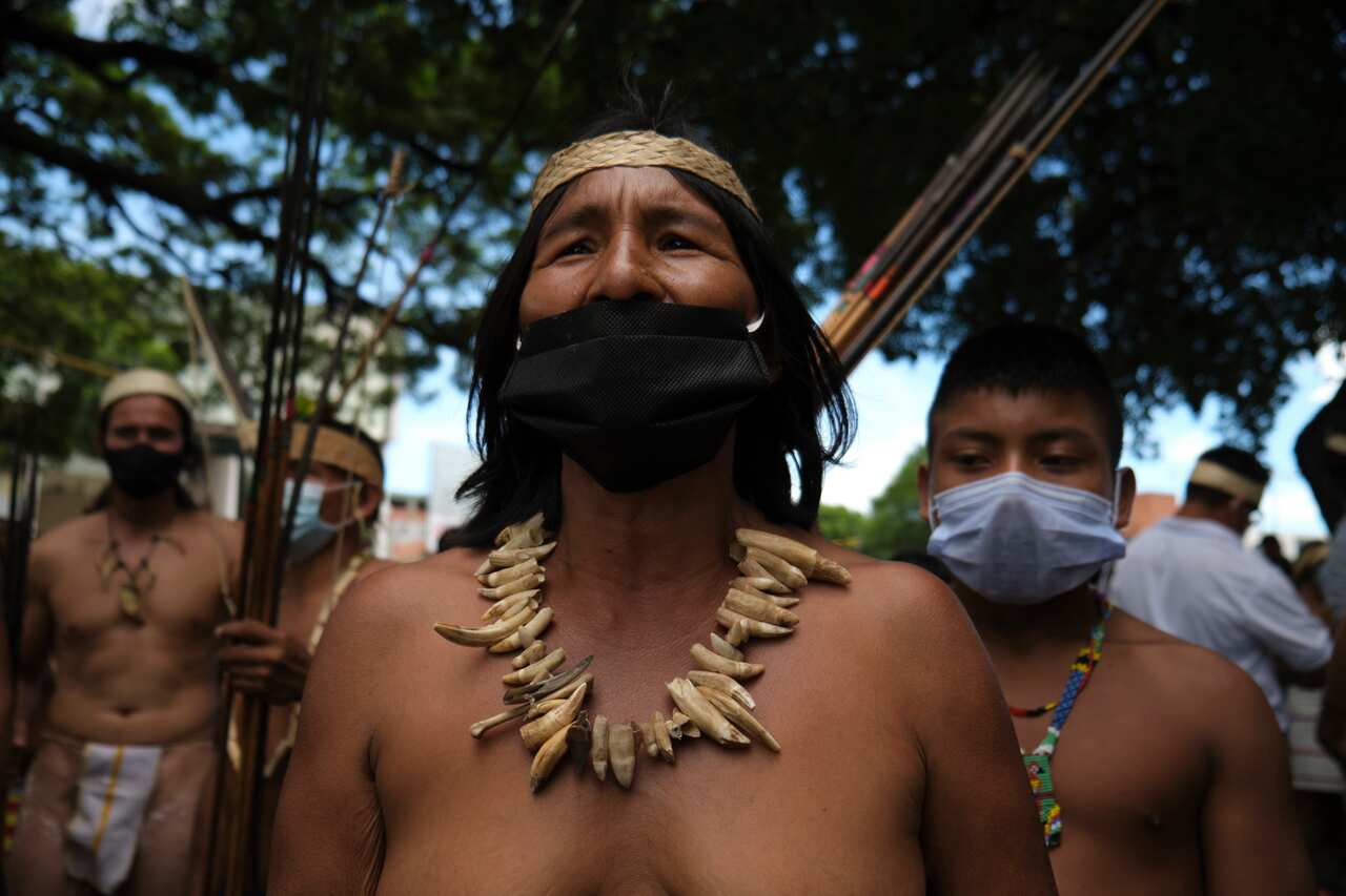 Members of the Bari ethnic group that live in the Catatumbo area march during an anti-government protest in Cucuta, 31 May 2021. 
