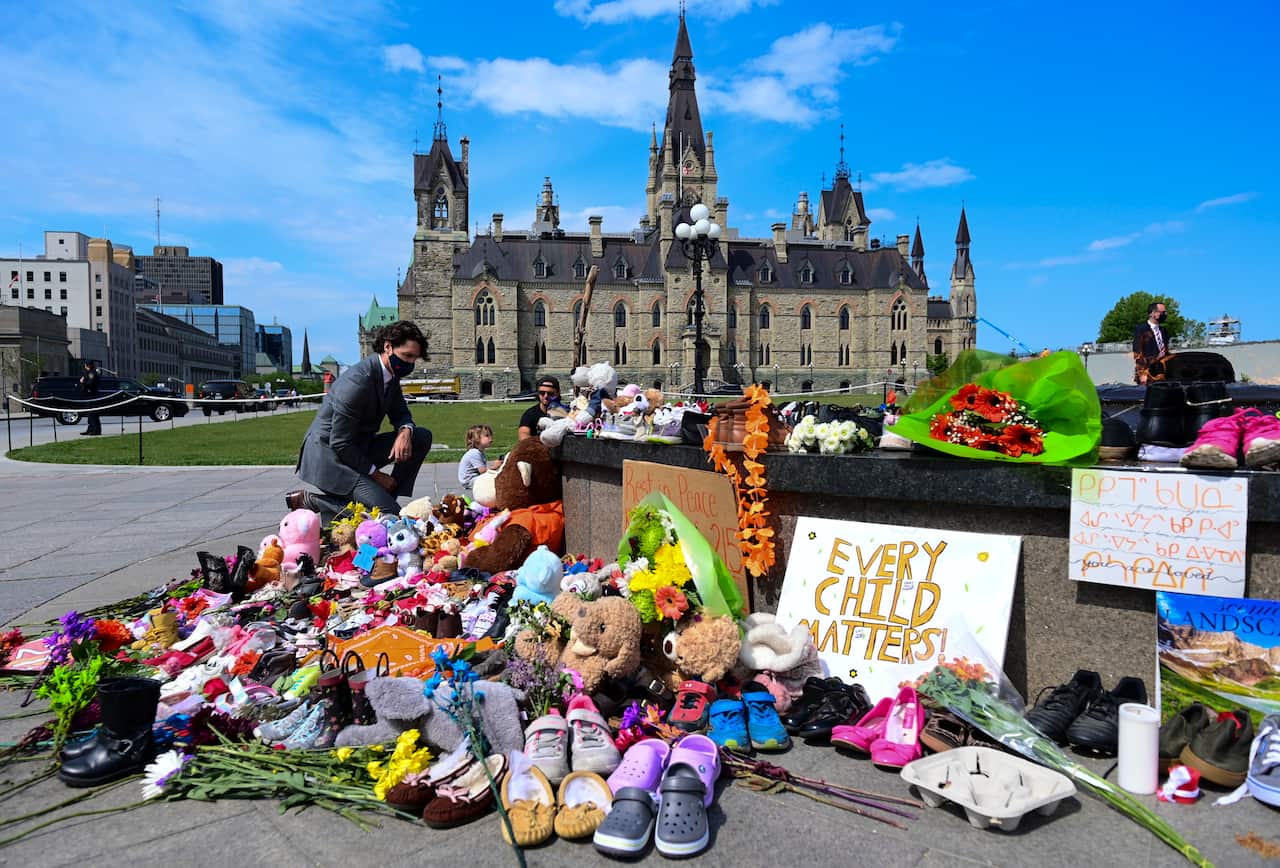 Canadian Prime Minister Justin Trudeau visits a memorial in Ottawa on 1 June. after children's remains were found at a former residential school in Kamloops. 