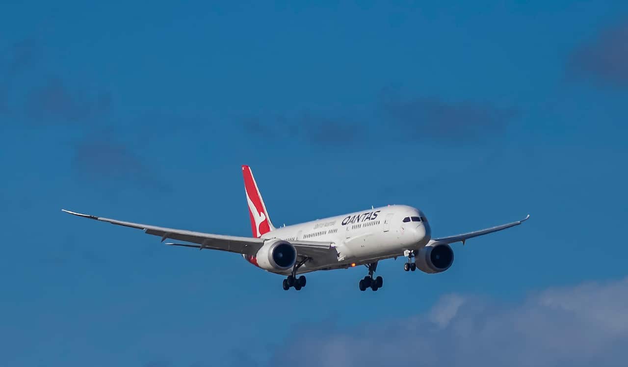 A Qantas repatriation flight from India on final approach into Adelaide Airport in Adelaide, Friday, June 4, 2021. (AAP Image/Roy Vandervegt) NO ARCHIVING