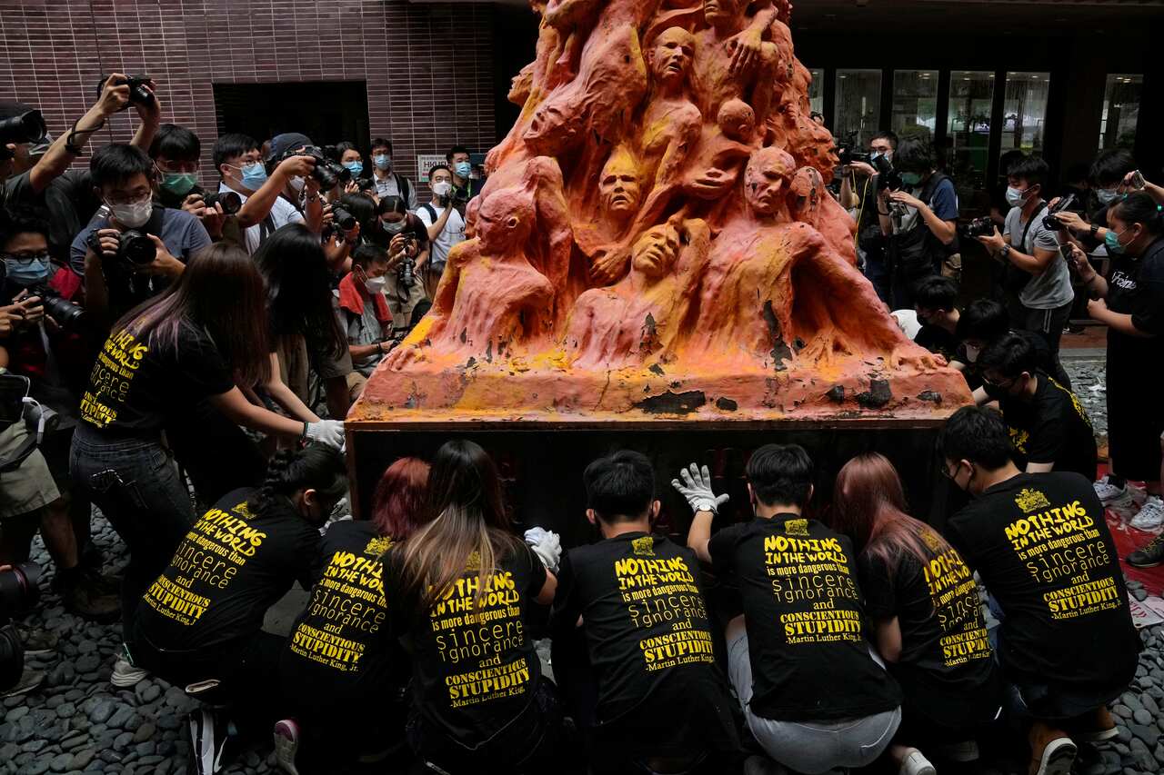  Police arrested an organizer of Hong Kong's annual candlelight vigil remembering the deadly Tiananmen Square crackdown and warned people not to attend the banned event Friday as authorities mute China's last pro-democracy voices. (AP Photo/Kin Cheung)