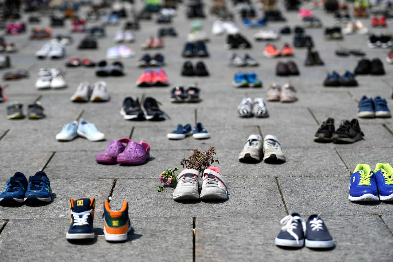 A memorial for the 215 children whose remains were found at the grounds of the former Kamloops Indian Residential School in British Columbia.