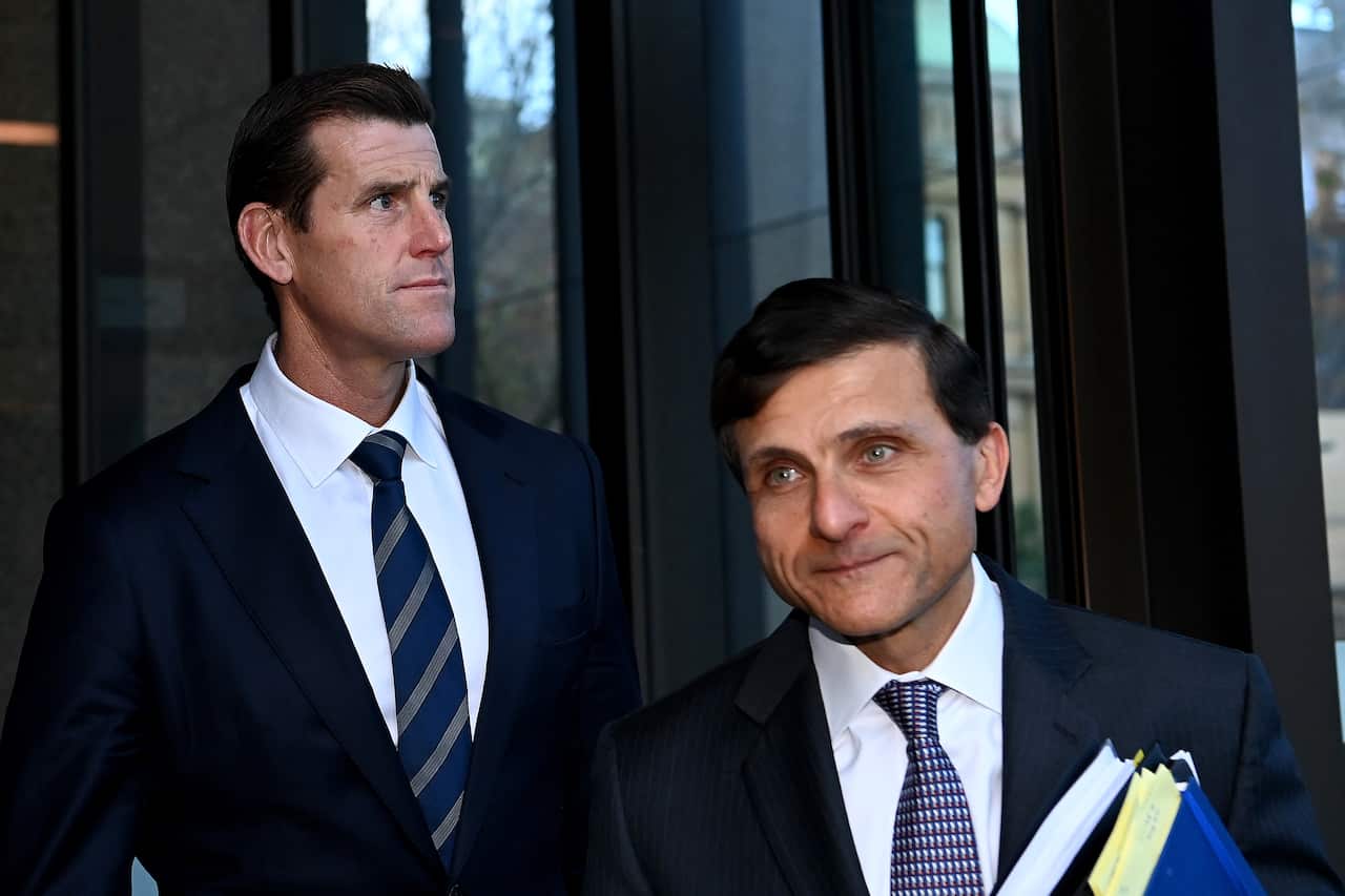 Ben Roberts Smith (left) leaves the Federal Court in Sydney on Wednesday, 9 June. 2021. 