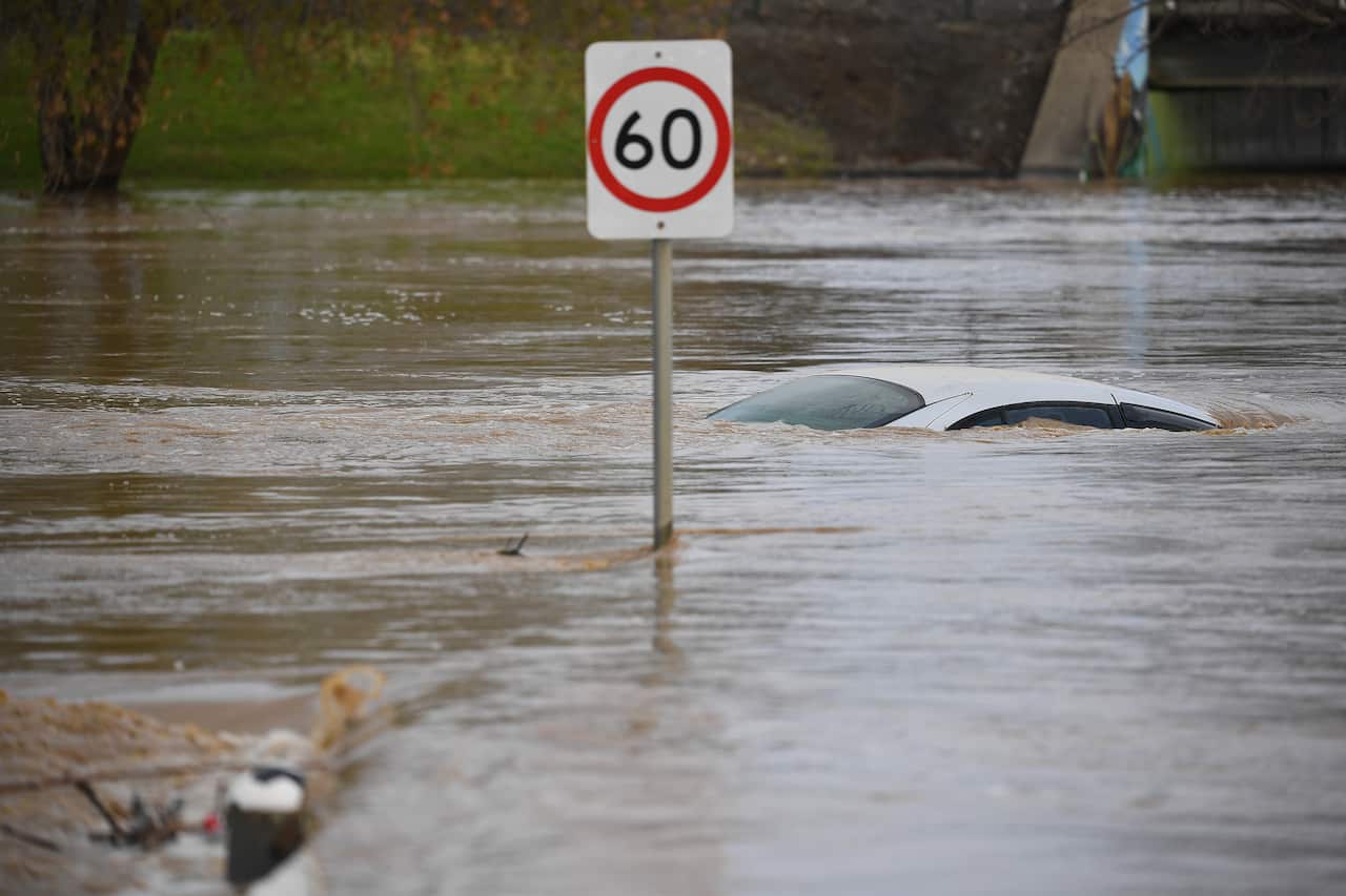 A car is seen submerged by flood water in Traralgon, Victoria, on Thursday, 10 June, 2021. 