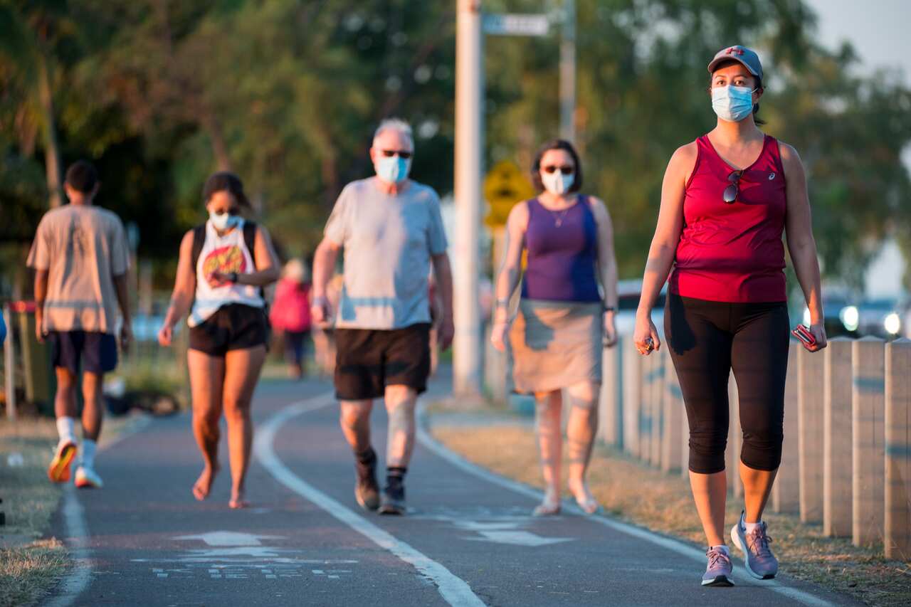 Locked down Darwinites out exercising along the foreshore at Nightcliff, in Darwin.