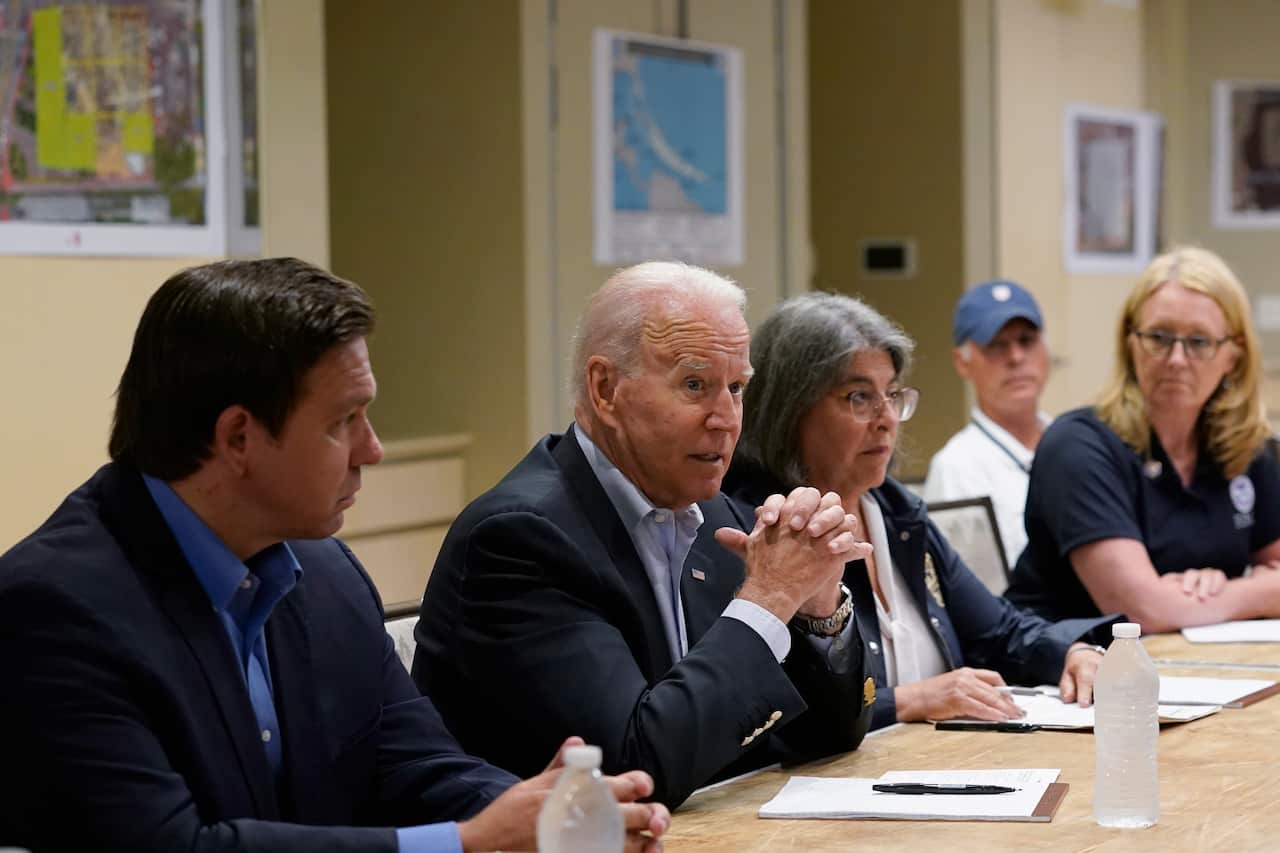 Biden met with firefighters and other first responders who have been searching for victims at the collapsed site in Florida.