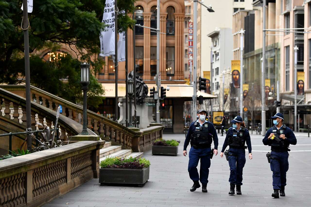 NSW Police patrol George Street in Sydney's CBD on Tuesday, 20 July, 2021. 