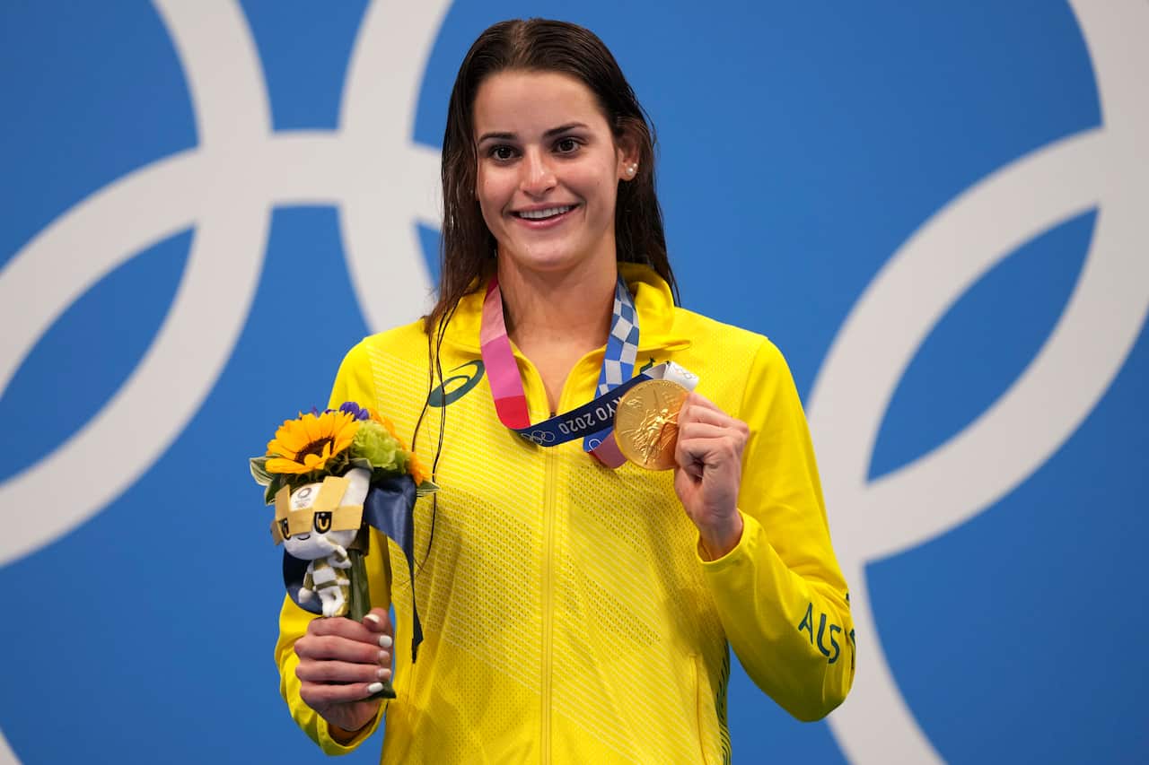 Australia's Kaylee McKeown poses with her gold medal after winning the final of the women's 100-metre backstroke at the Tokyo Olympic Games