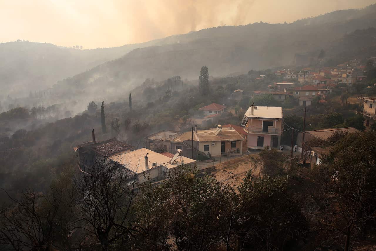 The wildfire passed through Viliza village in the area of Ancient Olympia in Greece.