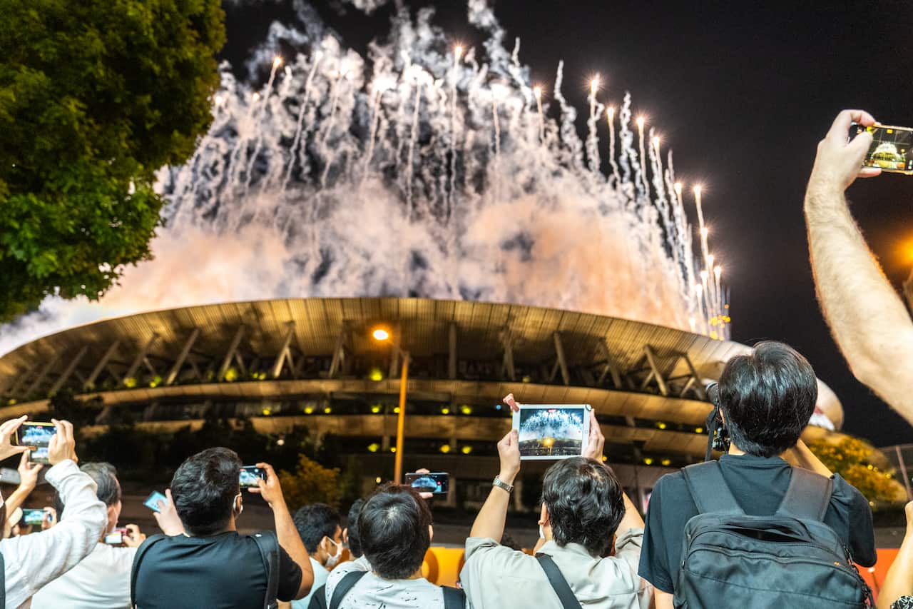 People gather outside of National Stadium during closing ceremony of the Tokyo 2020 Olympics, on 8 August, 2021 in Tokyo, Japan. 