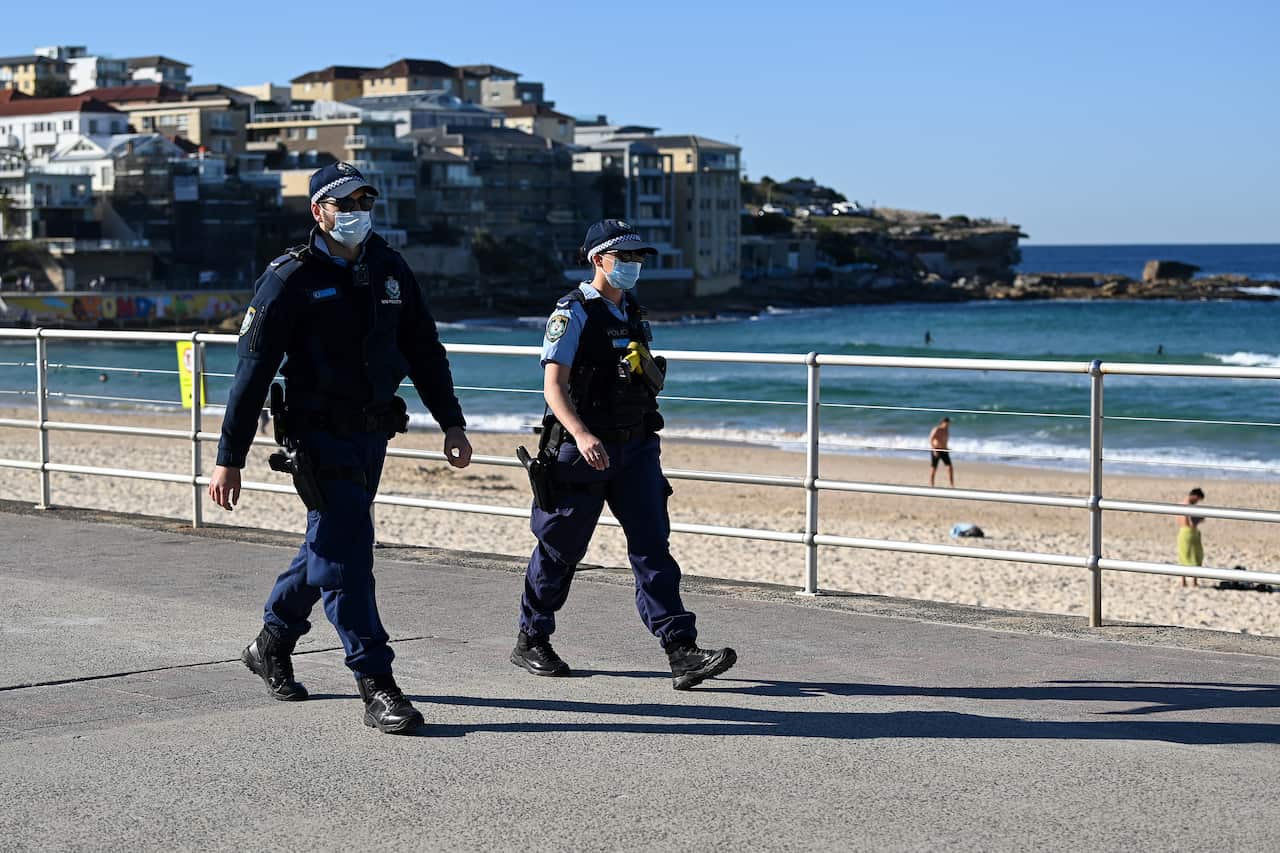 NSW Police officers patrol Bondi Beach in Sydney on Monday morning.