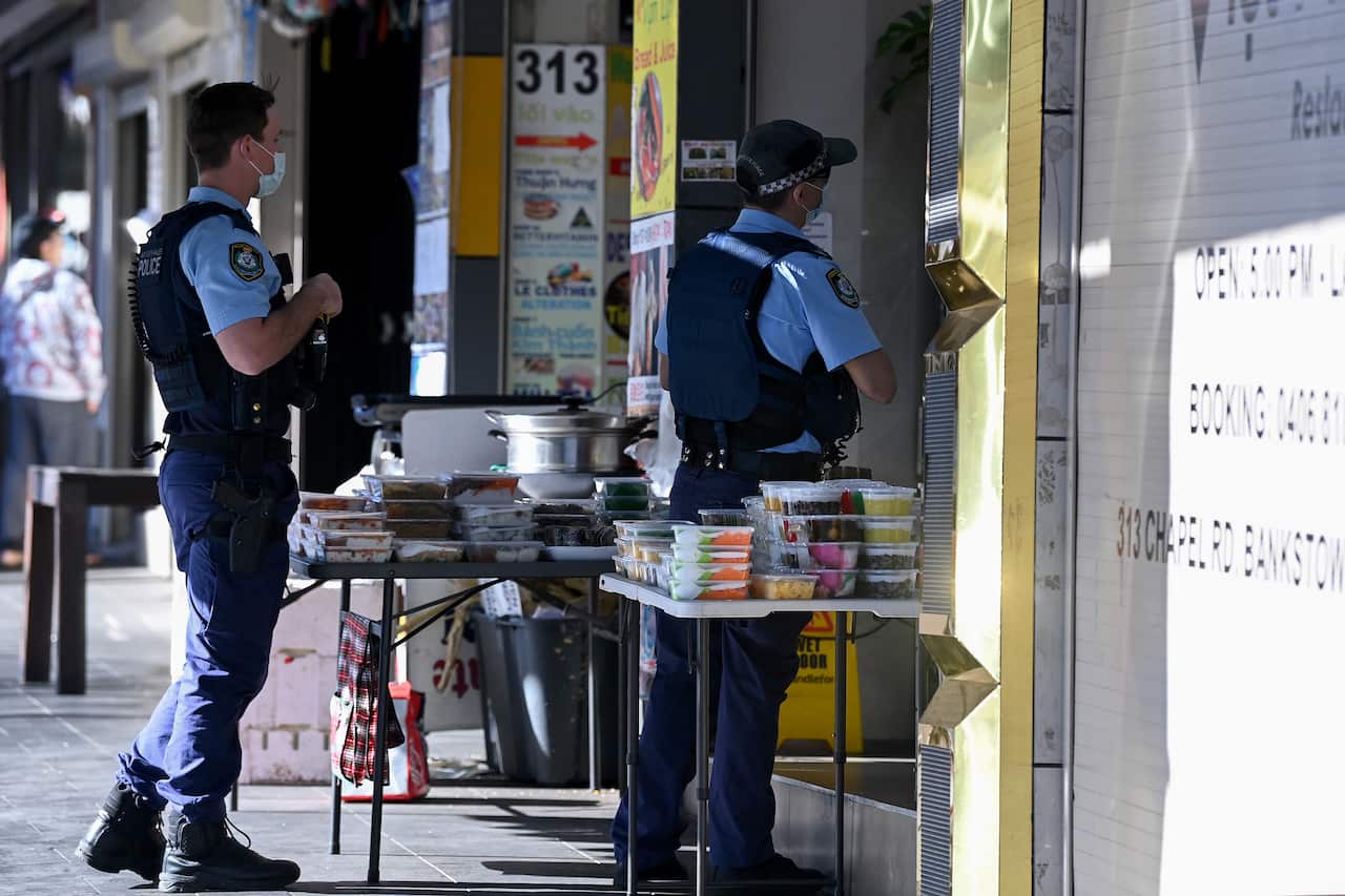 NSW Police Officers patrol the main shopping district of Bankstown, Sydney.
