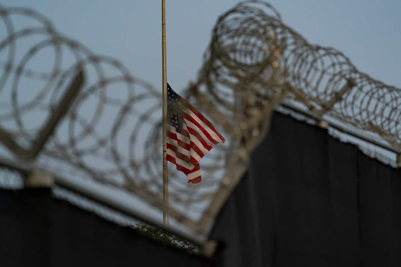 A US flag is seen from Camp Justice in Guantanamo Bay Naval Base, Cuba.