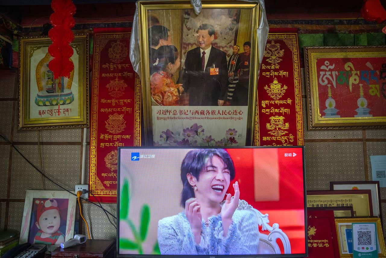 FILE - In this June 4, 2021, file photo, a television shows a broadcast of a Chinese talk show program (AP Photo/Mark Schiefelbein, File)