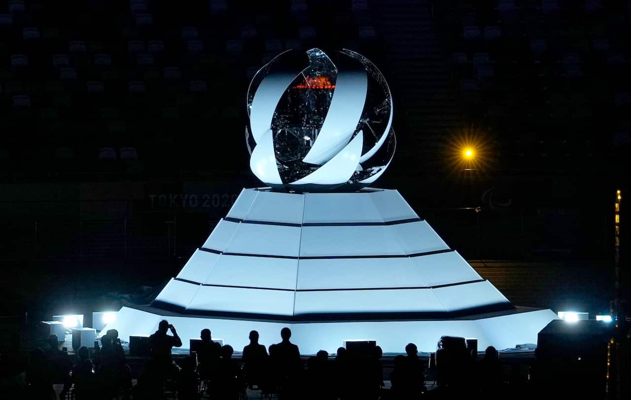The Paralympic flame is extinguished at the end of the closing ceremony of the Tokyo Paralympics at the National Stadium in Tokyo on Sept. 5, 2021. (Kyodo via AP Images) ==Kyodo