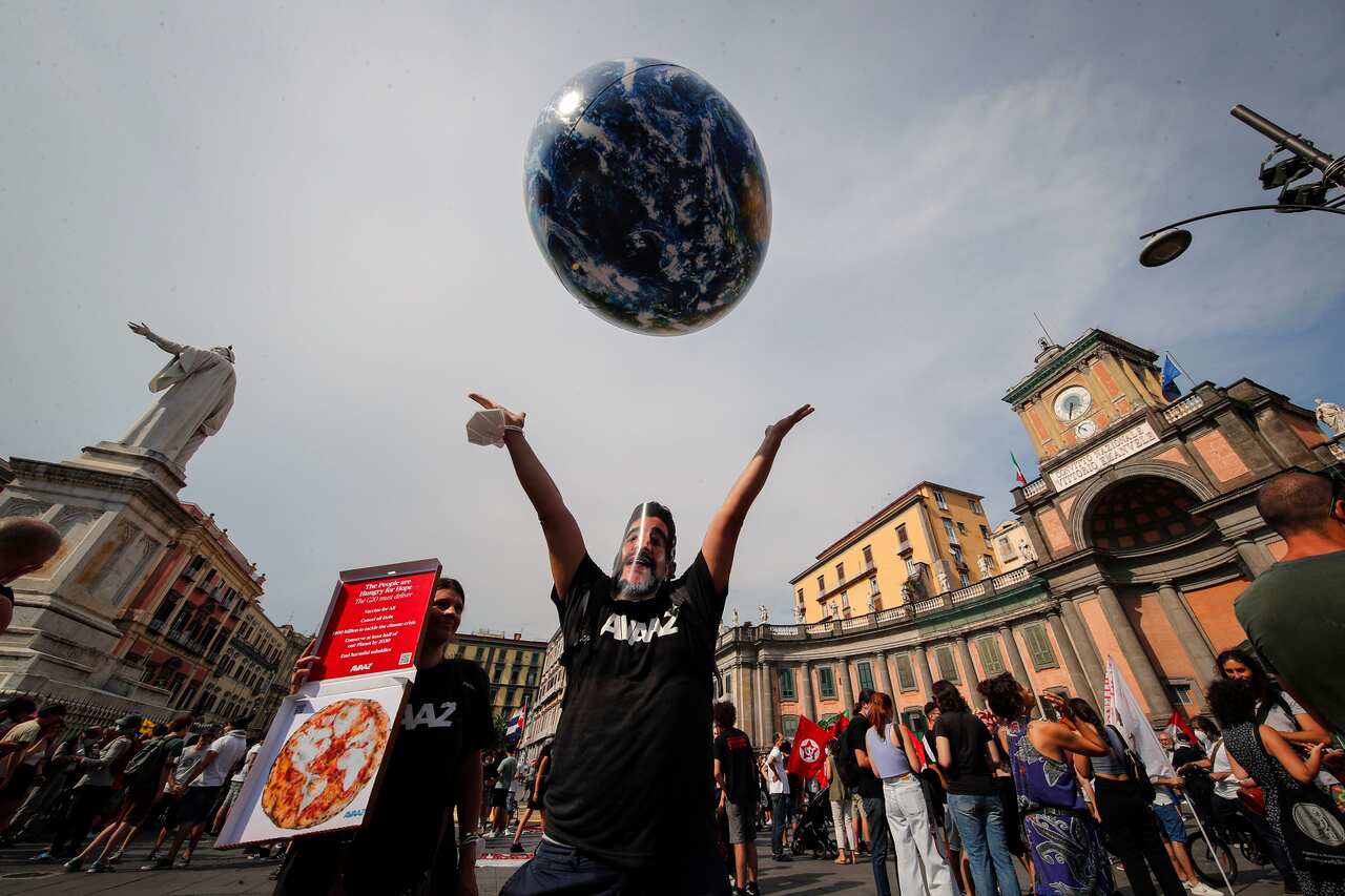 People demonstrate on the sidelines of a G20 environment meeting, in Naples, Italy, Thursday, July 22, 2021.