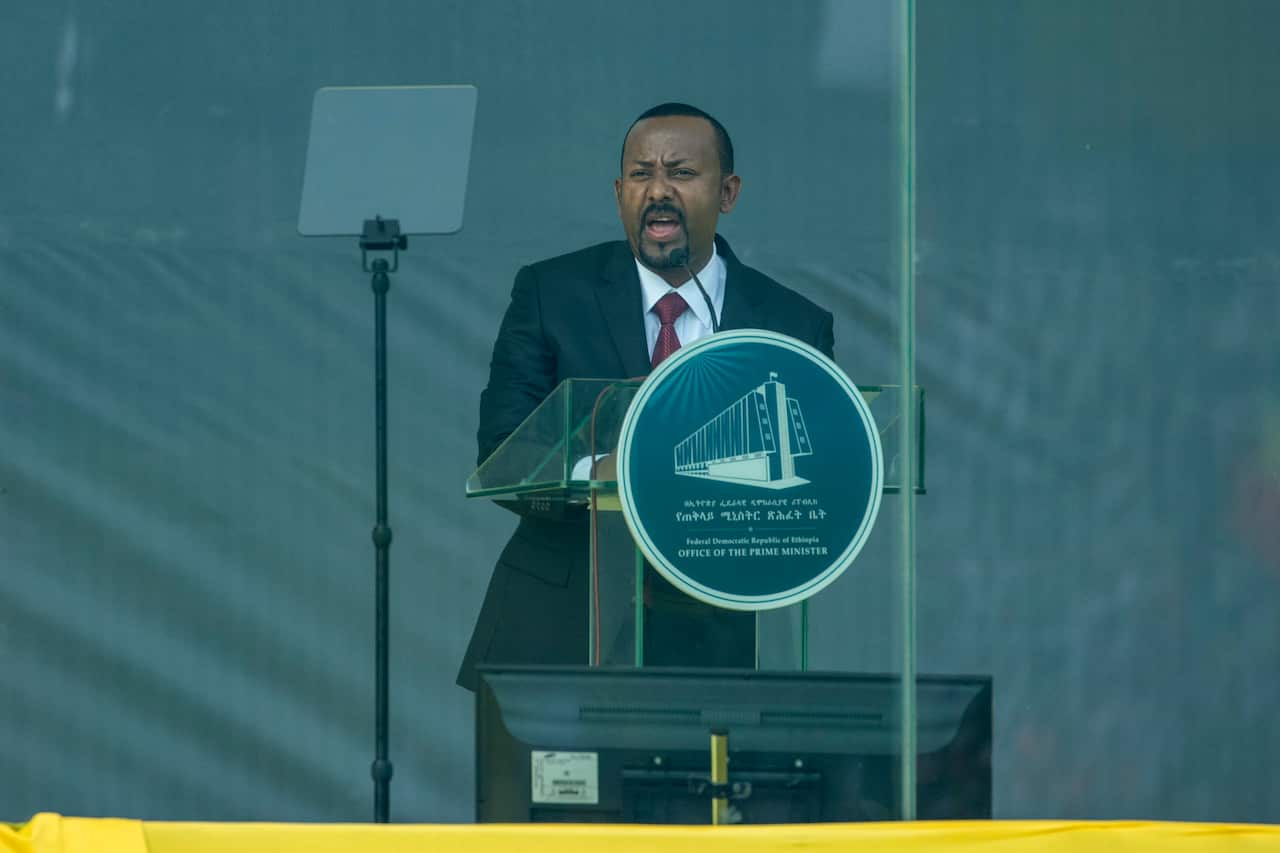 Ethiopia's Prime Minister Abiy Ahmed speaks behind bulletproof glass at his inauguration ceremony earlier in October