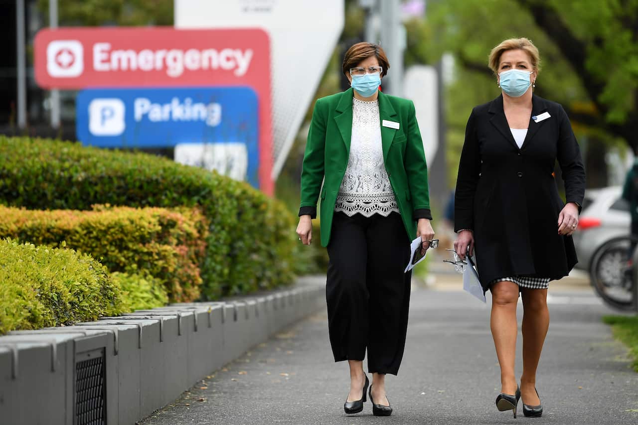 CEO of The Royal Childrens Hospital Bernadette McDonald (left) arrives to speak to media during a press conference.
