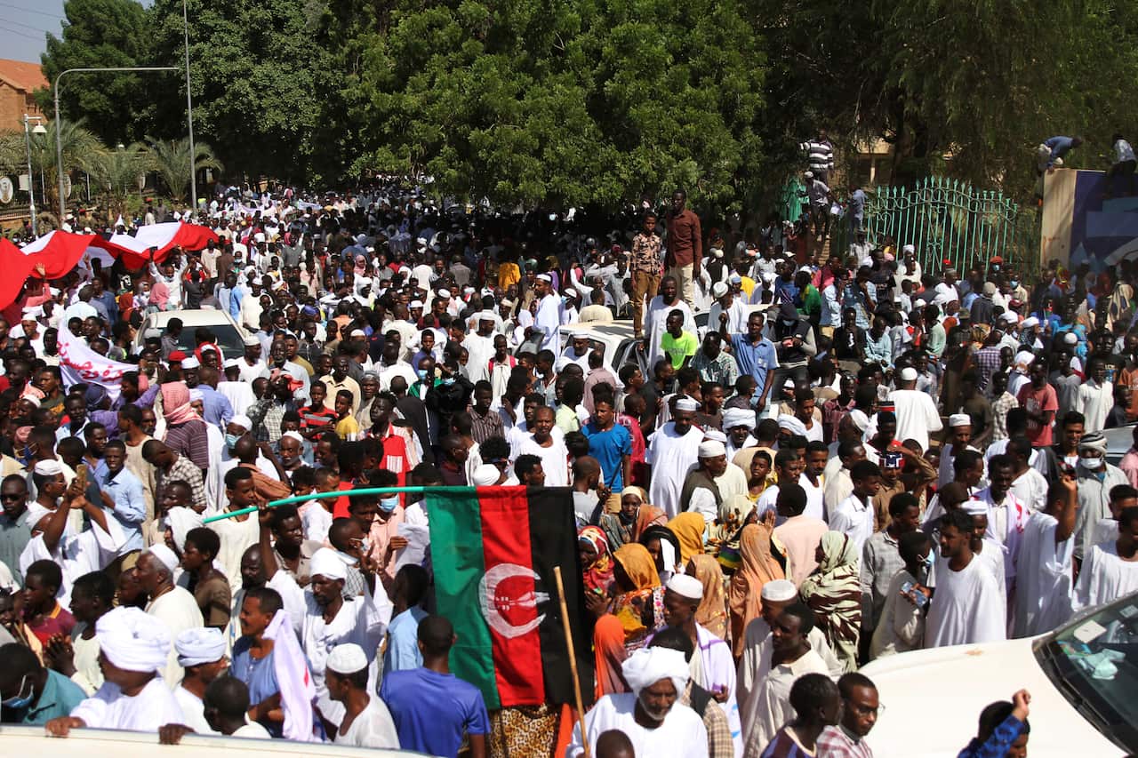 Sudanese protesters take part in a rally demanding the dissolution of the transitional government