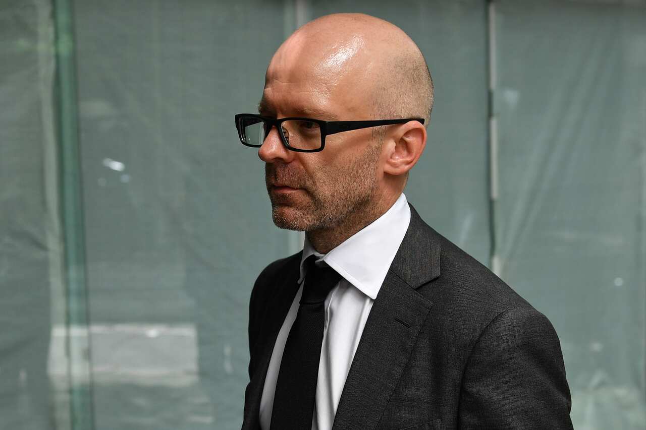 Chris Hanger returns during a break at the ICAC hearing.