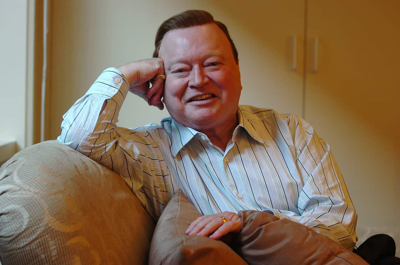 Australian television personality Bert Newton relaxes in his dressing room in Melbourne in June 2006.