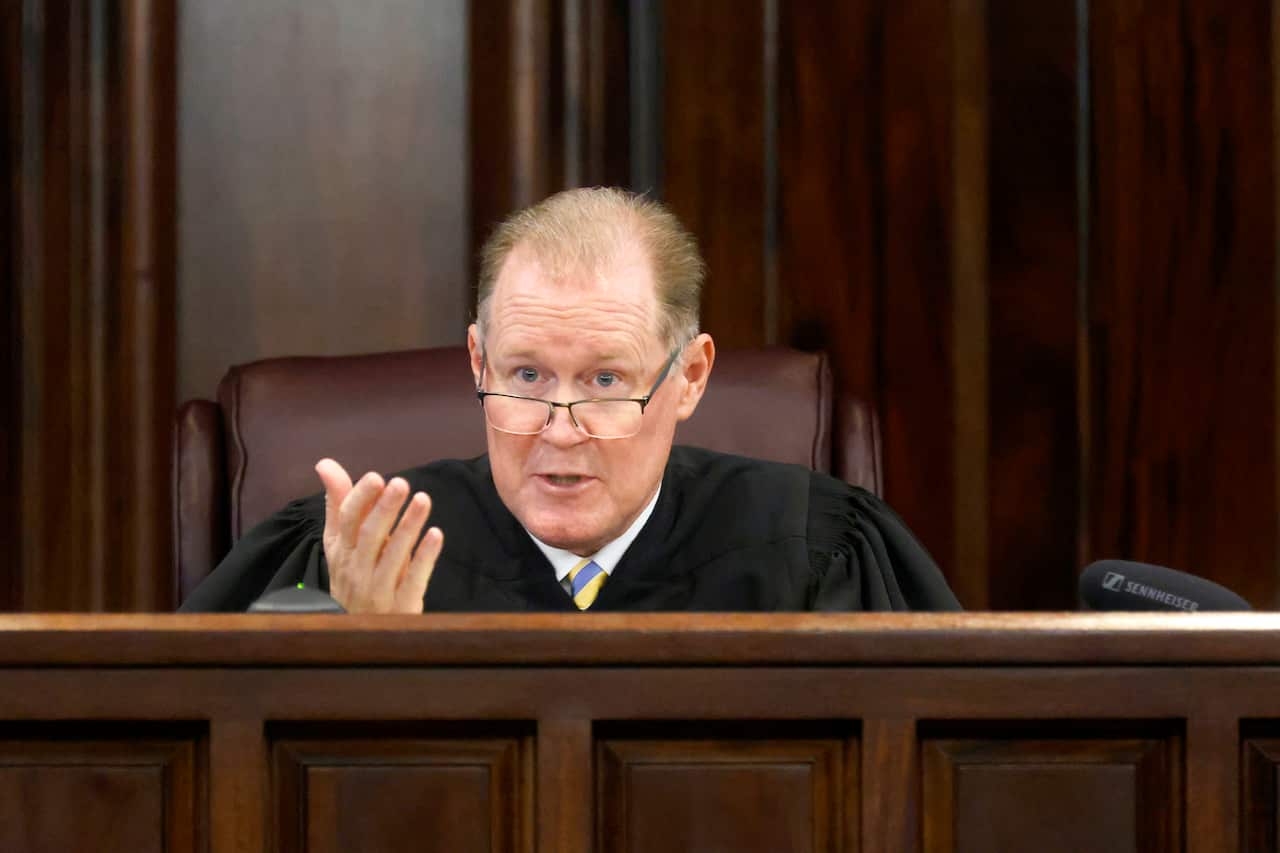 Superior Court Judge Timothy Walmsley speaks during opening statements in the trial.